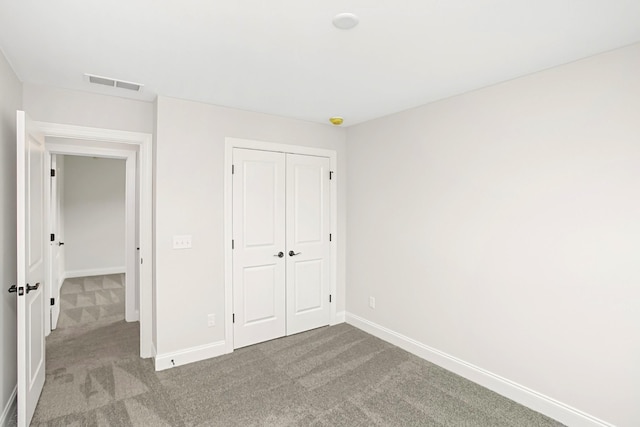 1714 Allwood Ave E, Murfreesboro, TN 37128 - unfurnished bedroom with a closet, carpet, visible vents, and baseboards
