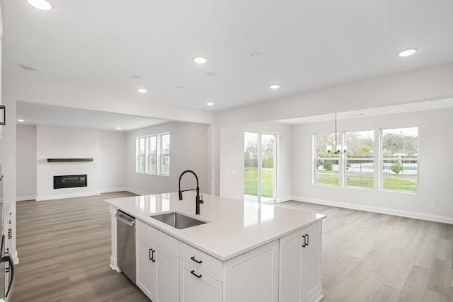 1714 Allwood Ave E, Murfreesboro, TN 37128 - kitchen with a notable chandelier, open floor plan, light wood-style flooring, dishwasher, and a sink