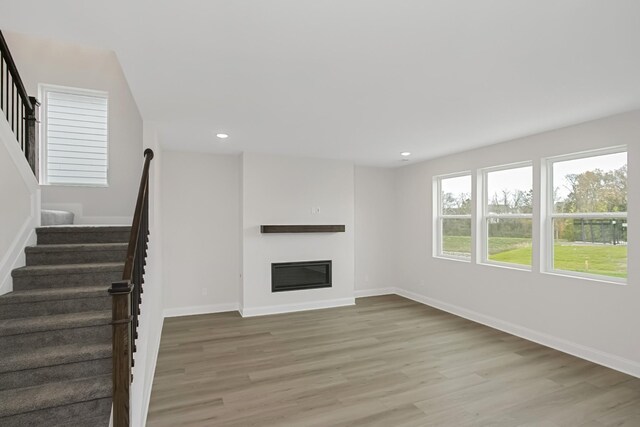 1714 Allwood Ave E, Murfreesboro, TN 37128 - unfurnished living room with recessed lighting, light wood finished floors, stairway, and baseboards
