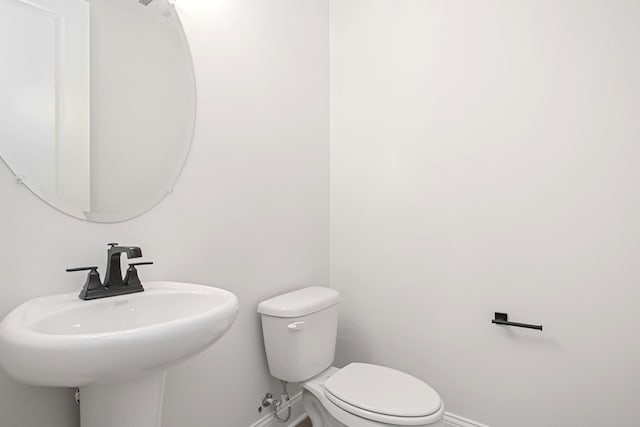 1714 Allwood Ave E, Murfreesboro, TN 37128 - half bath with baseboards, a sink, and toilet