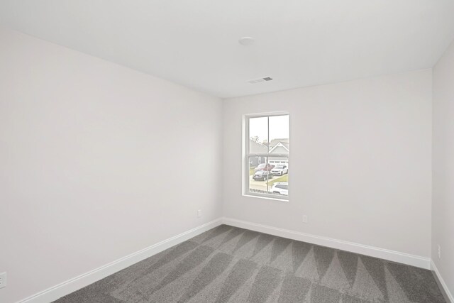 1714 Allwood Ave E, Murfreesboro, TN 37128 - empty room featuring dark carpet, baseboards, and visible vents