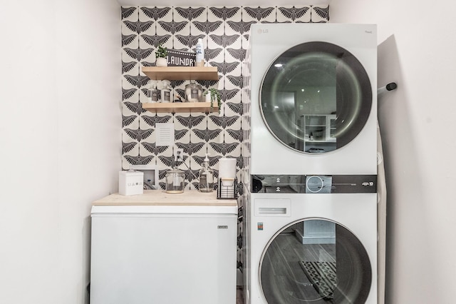 375 Mount Vernon Rd, Bethpage, TN 37022 - clothes washing area featuring laundry area, wallpapered walls, and stacked washer / drying machine
