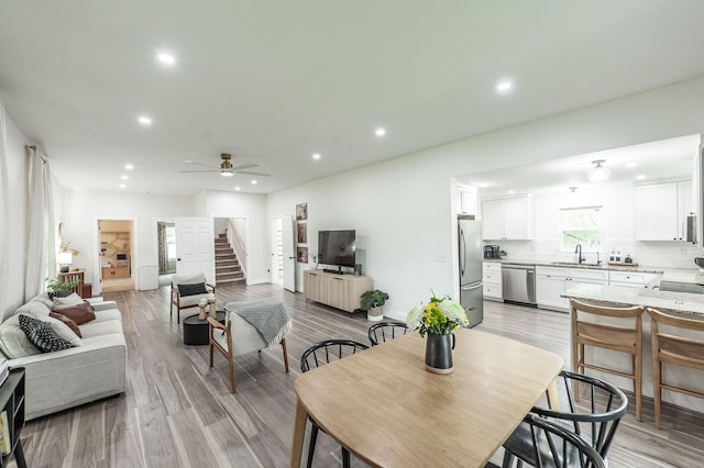 375 Mount Vernon Rd, Bethpage, TN 37022 - dining space featuring recessed lighting, stairway, light wood-style floors, and ceiling fan