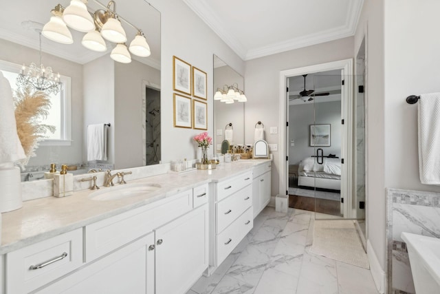 bathroom with double vanity, crown molding, marble finish floor, a sink, and ceiling fan with notable chandelier