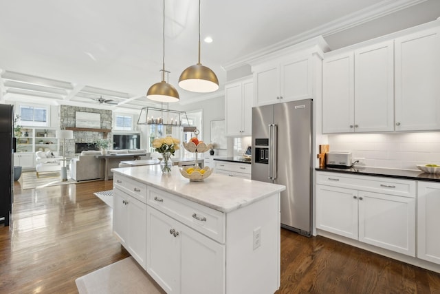 kitchen with open floor plan, a ceiling fan, a kitchen island, dark wood finished floors, and high quality fridge
