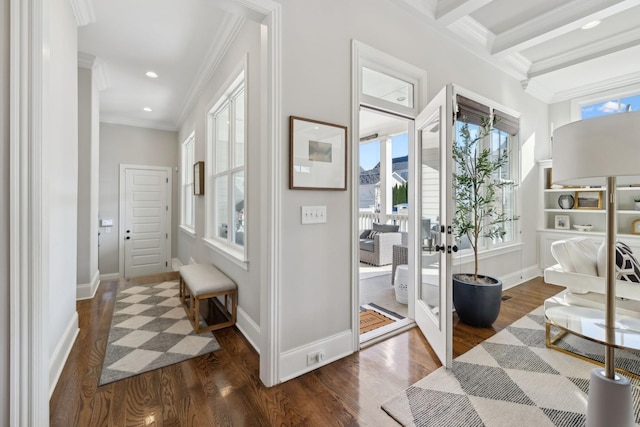 interior space with baseboards, ornamental molding, dark wood-style floors, beam ceiling, and french doors