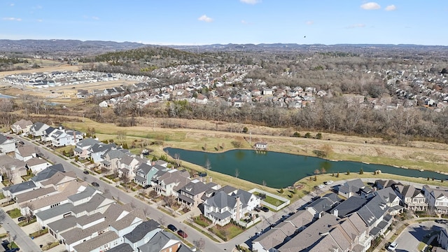 aerial view with a water view and a residential view