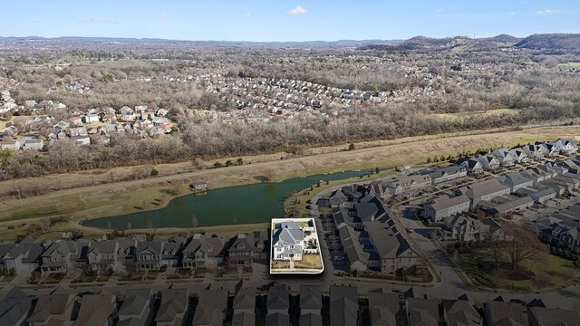 aerial view with a water view and a residential view