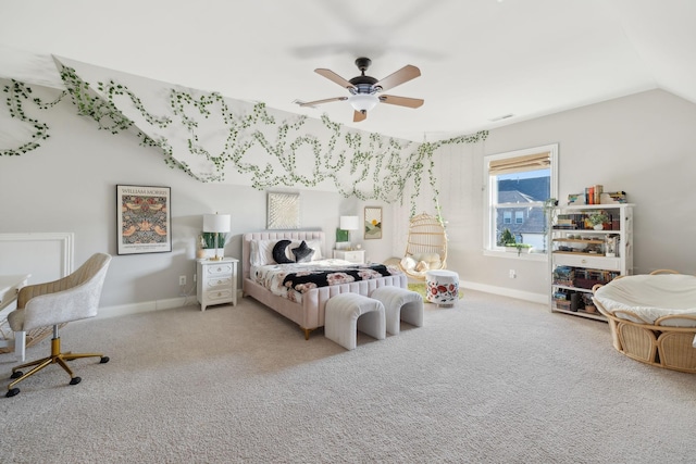 bedroom featuring carpet flooring, baseboards, a ceiling fan, and vaulted ceiling