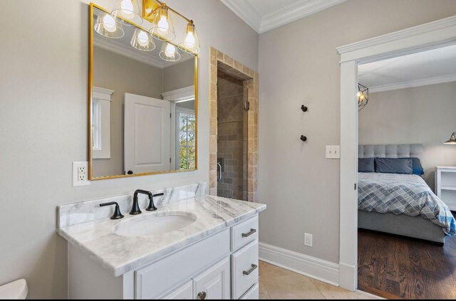 508 Huckleberry Rd, Nashville, TN 37205 - ensuite bathroom with crown molding, connected bathroom, vanity, tile patterned floors, and baseboards