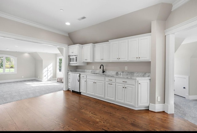 508 Huckleberry Rd, Nashville, TN 37205 - kitchen featuring visible vents, a sink, white cabinetry, vaulted ceiling, and stainless steel appliances