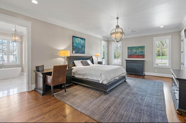 508 Huckleberry Rd, Nashville, TN 37205 - bedroom featuring multiple windows, an inviting chandelier, ornamental molding, and wood finished floors