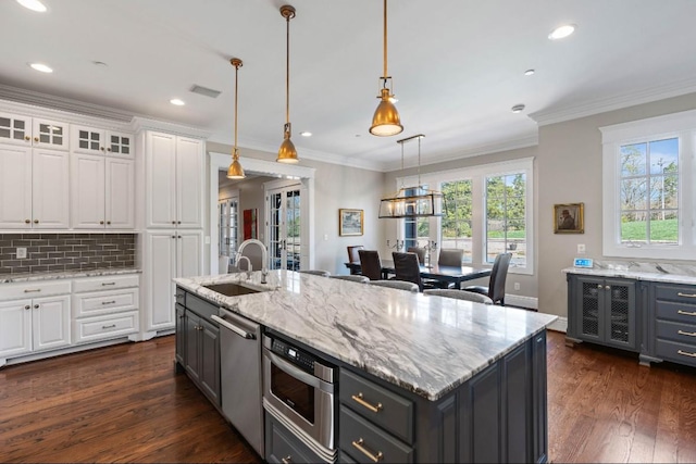 508 Huckleberry Rd, Nashville, TN 37205 - kitchen with stainless steel dishwasher, ornamental molding, white cabinetry, visible vents, and a sink