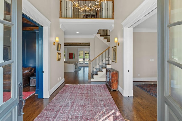 508 Huckleberry Rd, Nashville, TN 37205 - foyer entrance with ornamental molding, stairway, a notable chandelier, and dark wood finished floors