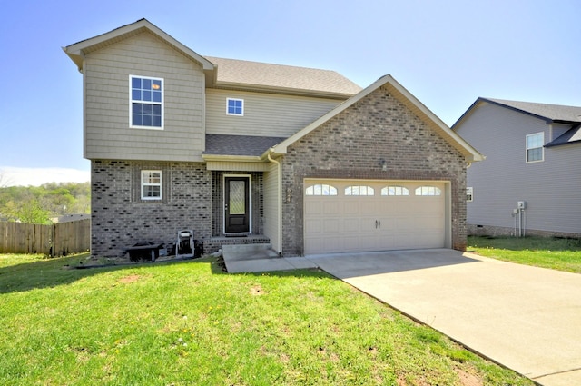 824 Crestone Ln, Clarksville, TN 37042 - view of front of home with concrete driveway, a front lawn, an attached garage, brick siding, and fence