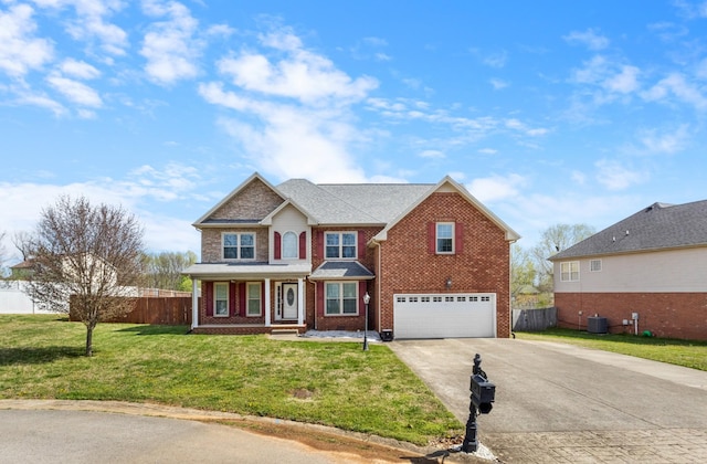 view of front facade with a garage, fence, brick siding, a front lawn, and driveway