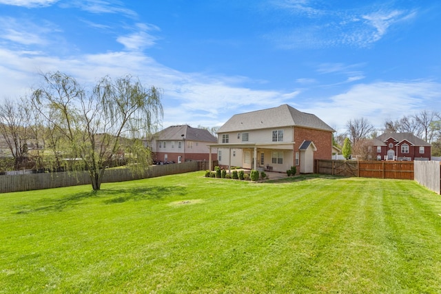 view of yard featuring a fenced backyard