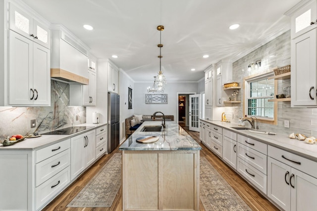 1132 Roseland Dr, Columbia, TN 38401 - kitchen with open shelves, recessed lighting, stainless steel fridge, and a sink