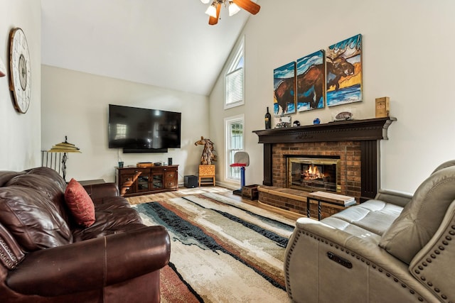 1132 Roseland Dr, Columbia, TN 38401 - living room featuring wood finished floors, a fireplace, ceiling fan, and high vaulted ceiling