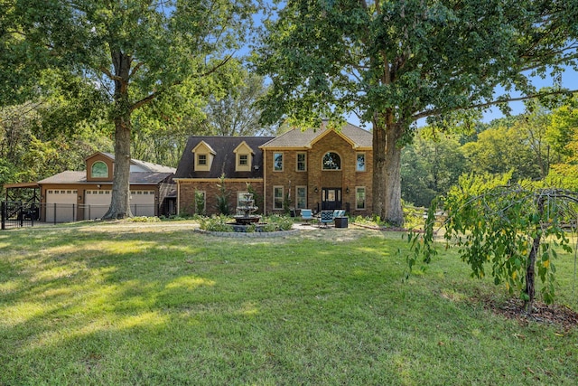 1132 Roseland Dr, Columbia, TN 38401 - rear view of house with a yard, a garage, and fence