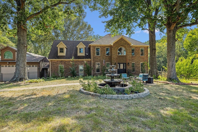 1132 Roseland Dr, Columbia, TN 38401 - view of front of property featuring a front yard, brick siding, and fence