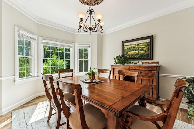 1132 Roseland Dr, Columbia, TN 38401 - dining space with an inviting chandelier, crown molding, baseboards, and light wood-type flooring