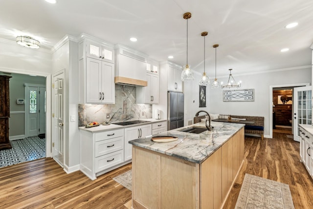 1132 Roseland Dr, Columbia, TN 38401 - kitchen featuring freestanding refrigerator, a center island with sink, wood finished floors, and a sink
