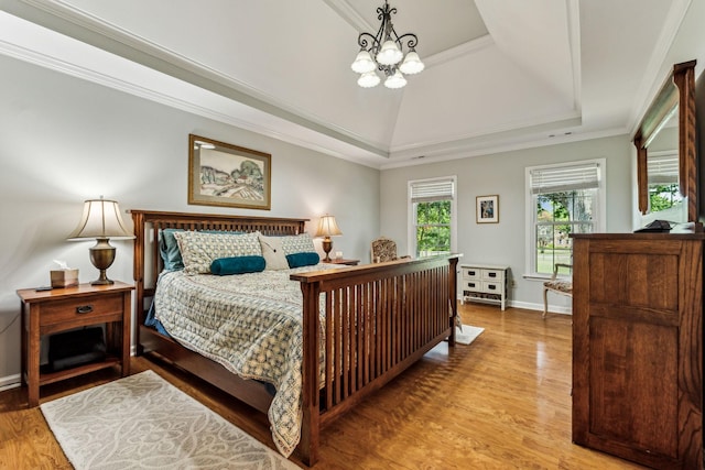 1132 Roseland Dr, Columbia, TN 38401 - bedroom with wood finished floors, ornamental molding, a chandelier, a raised ceiling, and baseboards