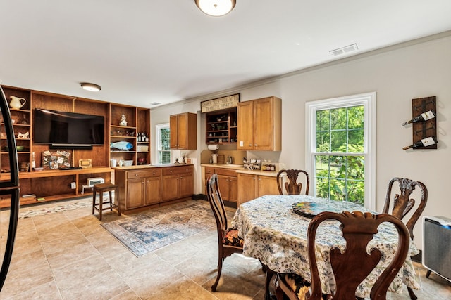 1132 Roseland Dr, Columbia, TN 38401 - dining space with crown molding and visible vents