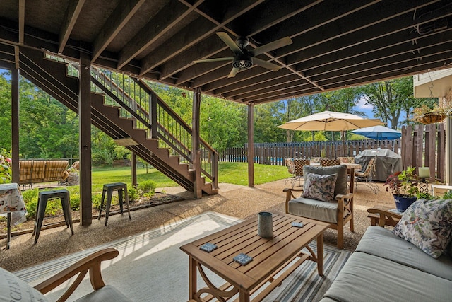 1132 Roseland Dr, Columbia, TN 38401 - view of patio featuring a ceiling fan, outdoor lounge area, a grill, stairway, and a fenced backyard