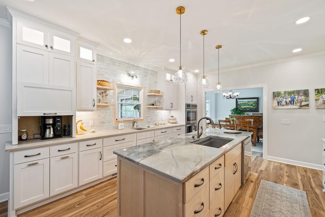 1132 Roseland Dr, Columbia, TN 38401 - kitchen with a sink, open shelves, a center island with sink, and backsplash