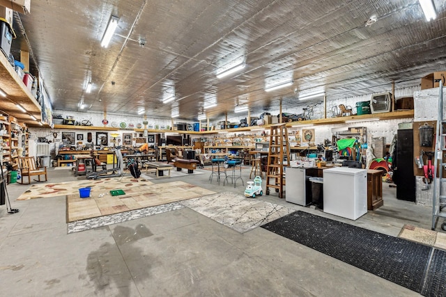 1132 Roseland Dr, Columbia, TN 38401 - miscellaneous room with a workshop area and concrete floors