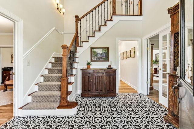 1132 Roseland Dr, Columbia, TN 38401 - entrance foyer with stairway, a towering ceiling, baseboards, and wood finished floors