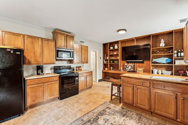 1132 Roseland Dr, Columbia, TN 38401 - kitchen featuring open shelves, black appliances, visible vents, and brown cabinets
