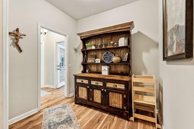 1132 Roseland Dr, Columbia, TN 38401 - bar with baseboards and light wood finished floors