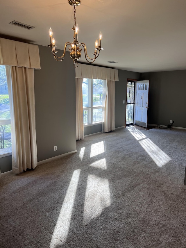 728 Robert Burns Dr, Nashville, TN 37217 - interior space with an inviting chandelier, baseboards, carpet flooring, and visible vents