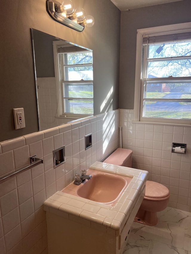 728 Robert Burns Dr, Nashville, TN 37217 - half bathroom featuring toilet, marble finish floor, plenty of natural light, and vanity