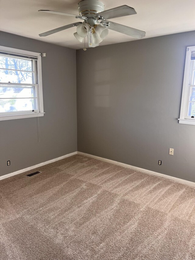 728 Robert Burns Dr, Nashville, TN 37217 - spare room with visible vents, ceiling fan, carpet floors, and baseboards
