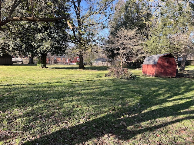 728 Robert Burns Dr, Nashville, TN 37217 - view of yard with fence, an outdoor structure, and a storage unit