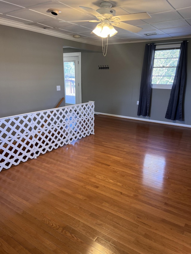 728 Robert Burns Dr, Nashville, TN 37217 - unfurnished room featuring crown molding, baseboards, a ceiling fan, and wood finished floors