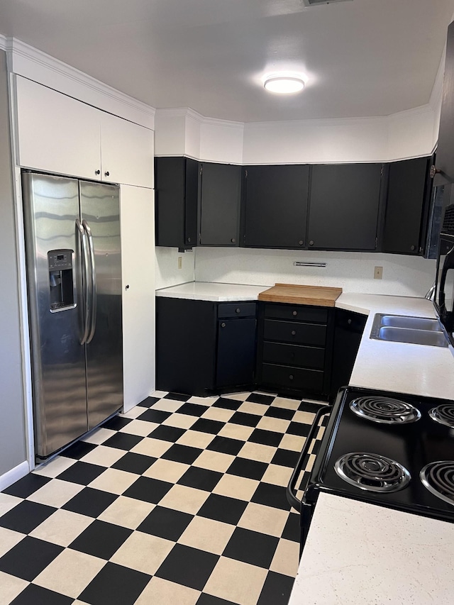 728 Robert Burns Dr, Nashville, TN 37217 - kitchen featuring stainless steel fridge with ice dispenser, dark cabinets, black electric range, and light floors