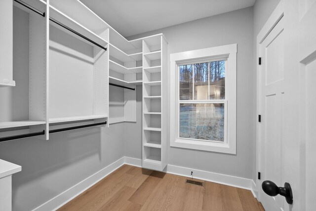 311 Riverview Dr, Dover, TN 37058 - walk in closet featuring light wood-style flooring and visible vents