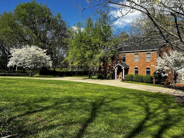 exterior space featuring concrete driveway