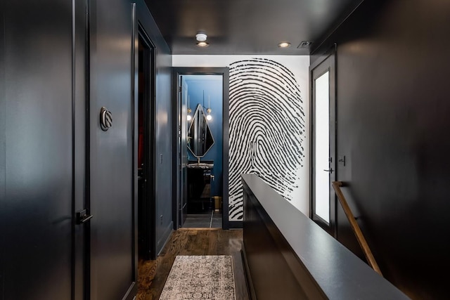 interior space with recessed lighting, visible vents, baseboards, and dark wood-style flooring