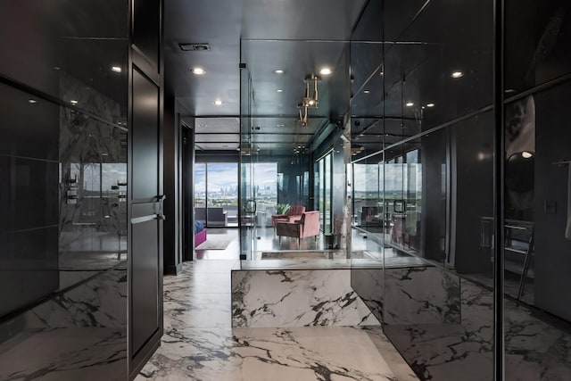 interior space with visible vents and marble finish floor