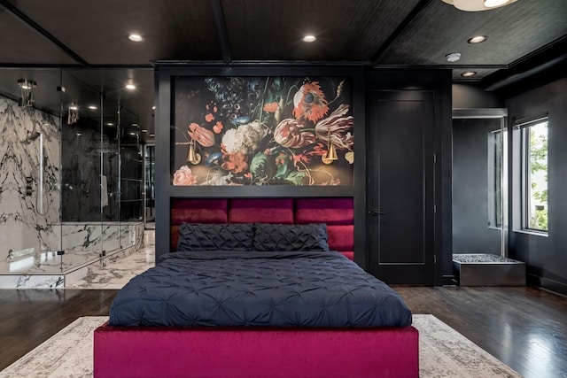 bedroom featuring wood finished floors and recessed lighting