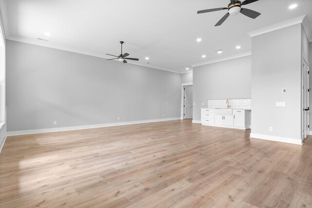 307 Riverview Dr, Dover, TN 37058 - unfurnished living room featuring ceiling fan, ornamental molding, baseboards, recessed lighting, and light wood finished floors
