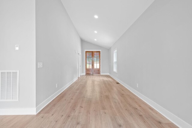307 Riverview Dr, Dover, TN 37058 - corridor featuring light wood-type flooring, lofted ceiling, recessed lighting, baseboards, and french doors