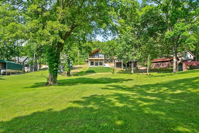 307 Riverview Dr, Dover, TN 37058 - view of grassy yard featuring a balcony