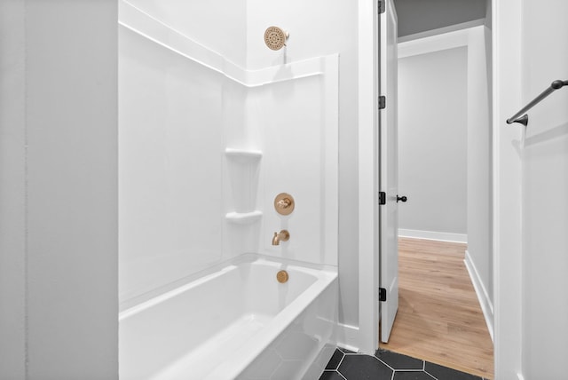 307 Riverview Dr, Dover, TN 37058 - bathroom with  shower combination, baseboards, and tile patterned flooring
